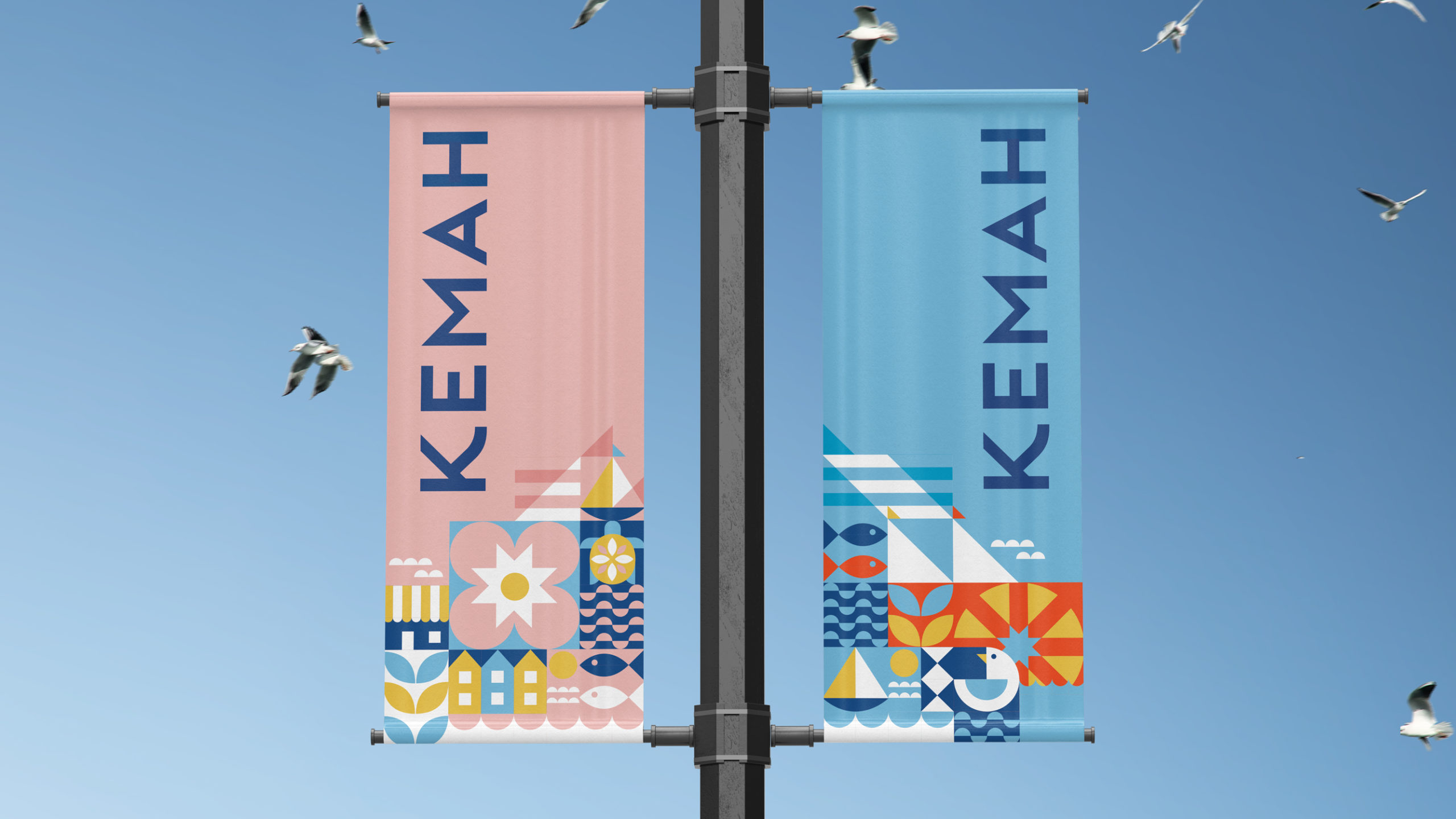 Showing the Kemah TX branding on banners hanging from a streetlight. Branding designed by MDR. Kemah is a small coastal town just outside of Houston.