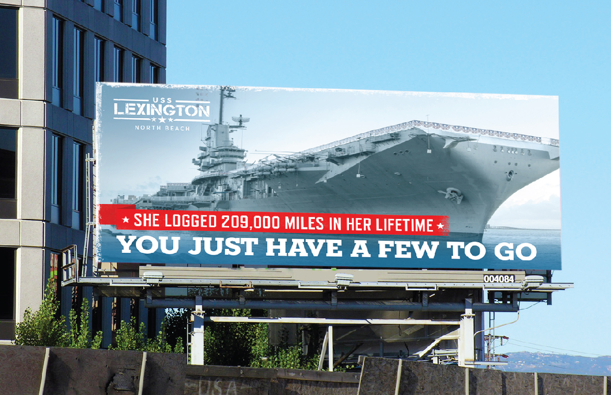 Showing a billboard for the USS Lexington.