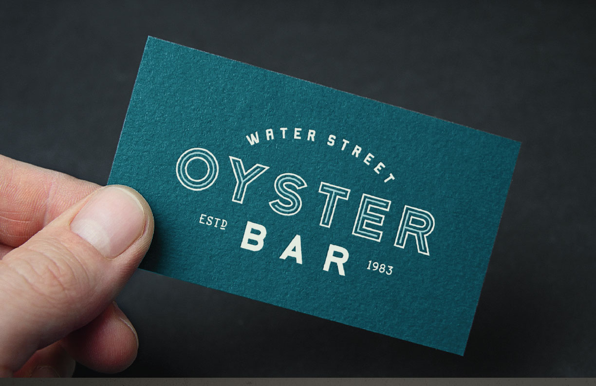 Showing the front of a business card for the Water Street Oyster Bar as designed by MDR.